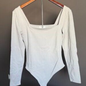 aritzia / babaton riverstone grey long-sleeve body suit